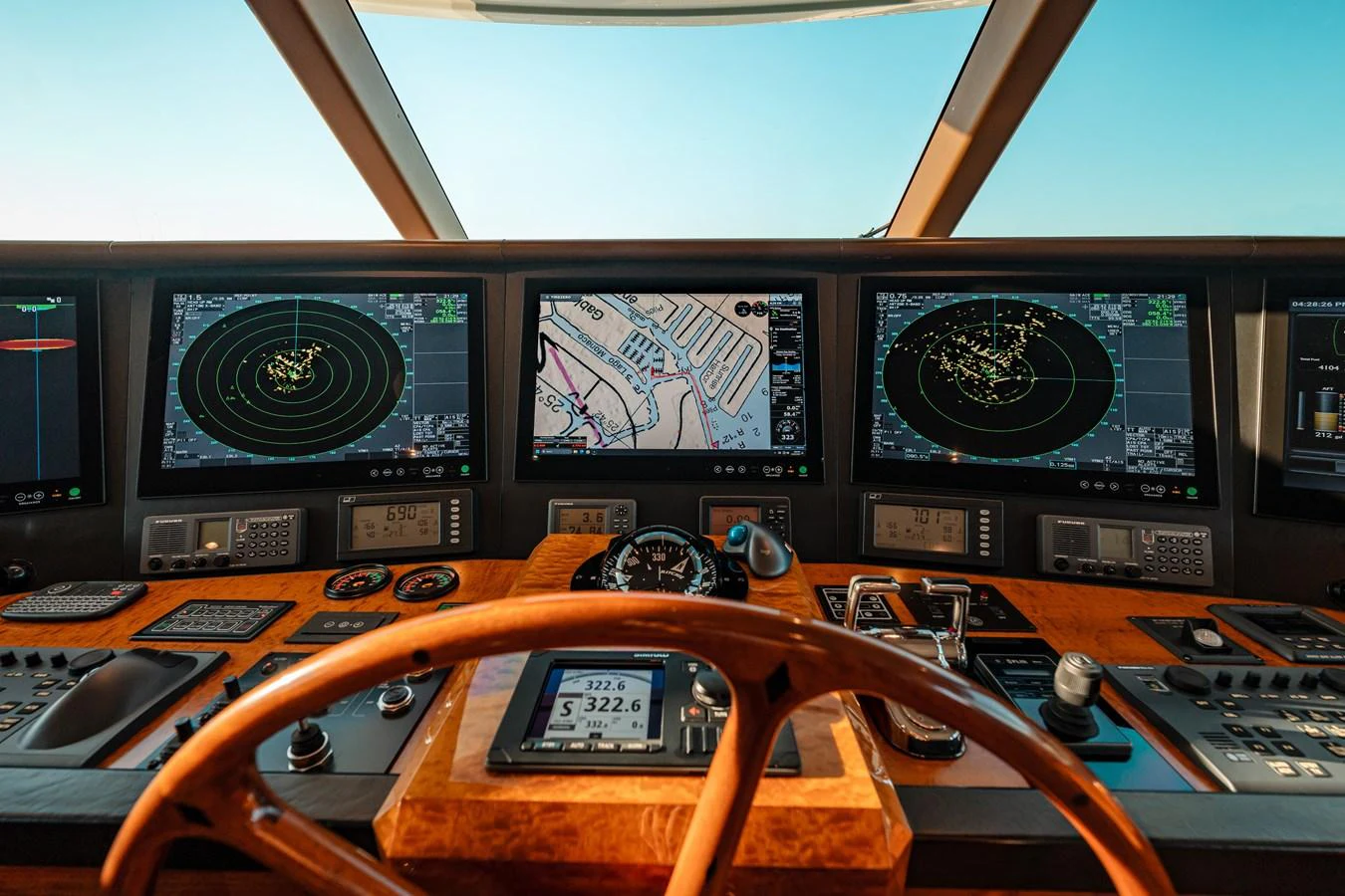 a room with a large screen and many screens aboard BLUE TIME Yacht for Sale