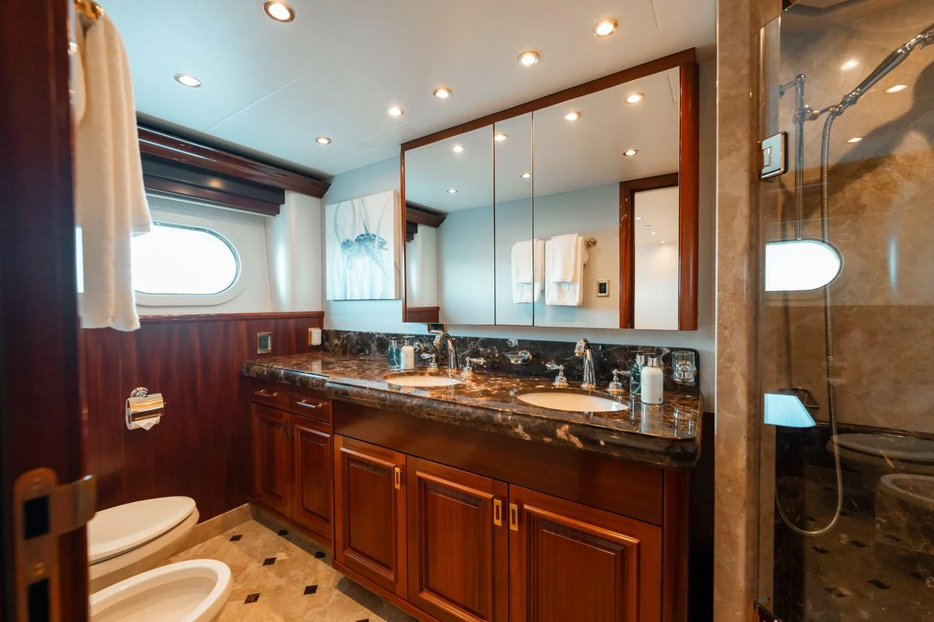 a bathroom with a large mirror aboard BLUE TIME Yacht for Sale