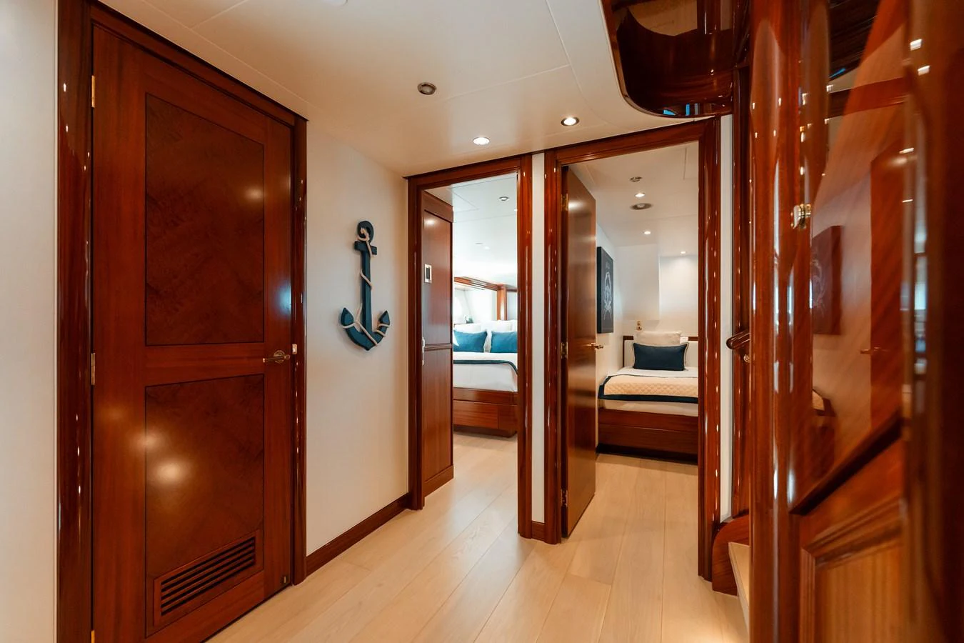 a room with wooden doors aboard BLUE TIME Yacht for Sale