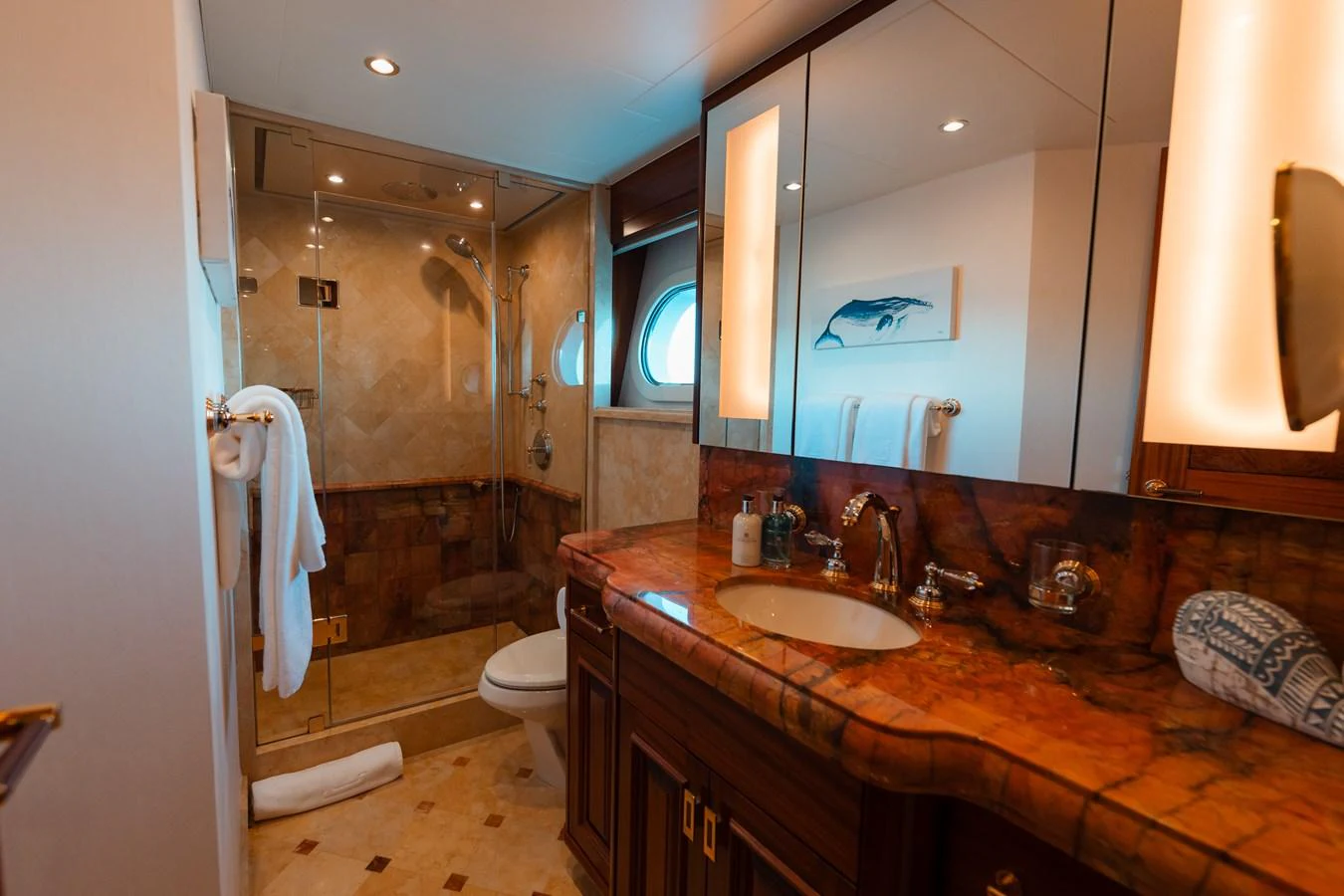 a bathroom with a large mirror aboard BLUE TIME Yacht for Sale