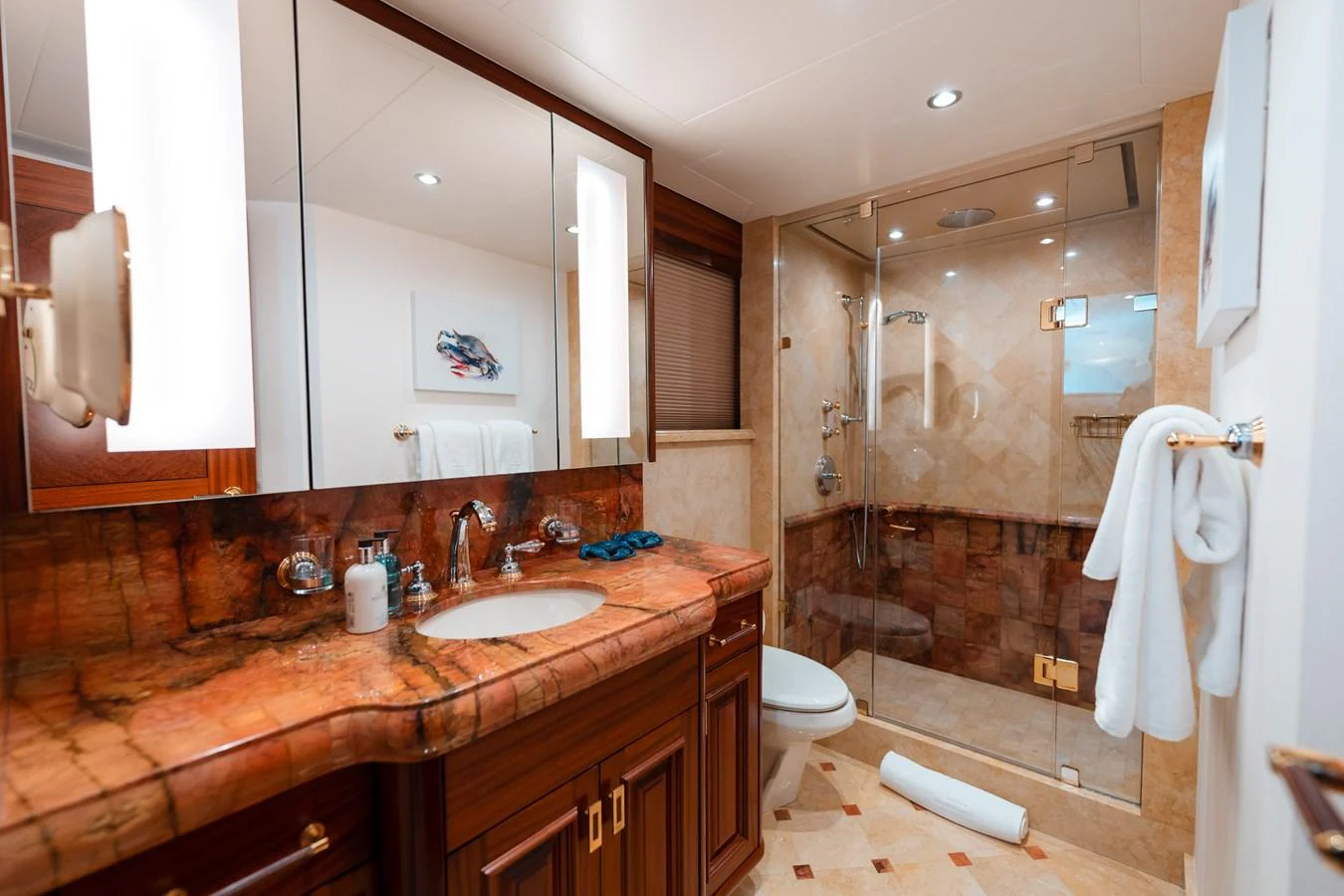 a bathroom with a large mirror aboard BLUE TIME Yacht for Sale