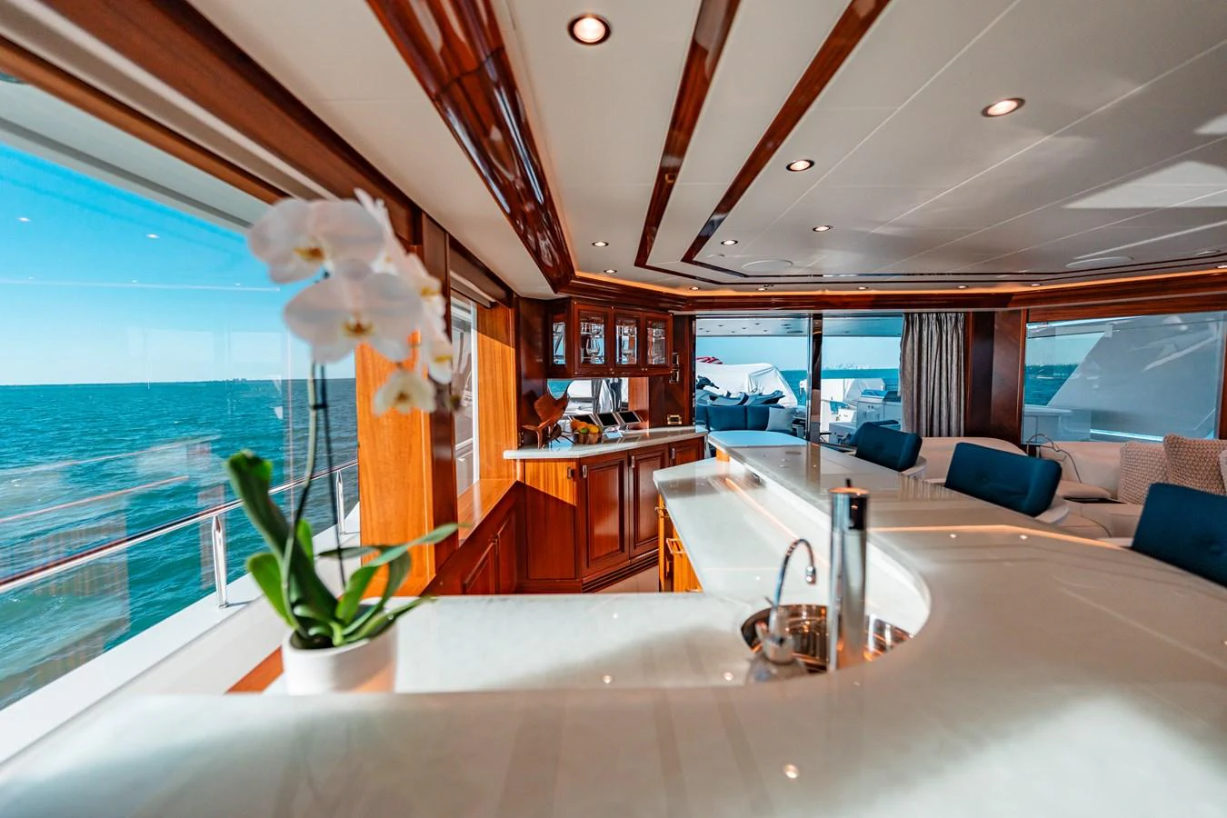 a modern looking kitchen with a large open floor plan aboard BLUE TIME Yacht for Sale