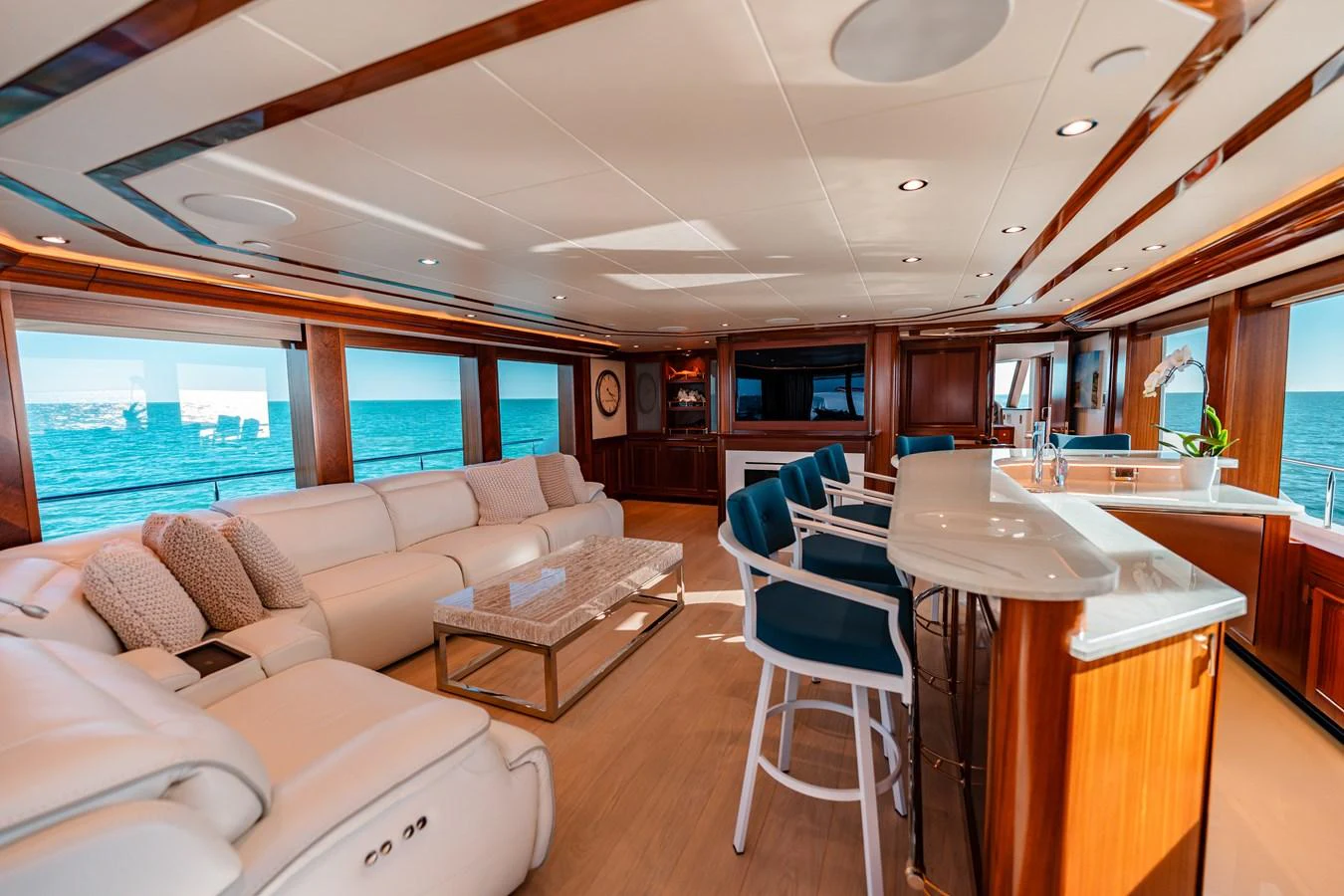 a living room with a couch and a table aboard BLUE TIME Yacht for Sale