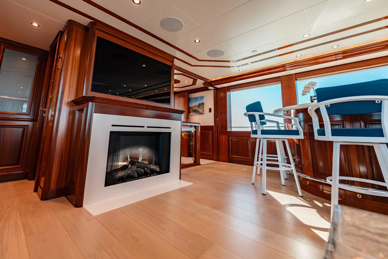 a fireplace in a room aboard BLUE TIME Yacht for Sale