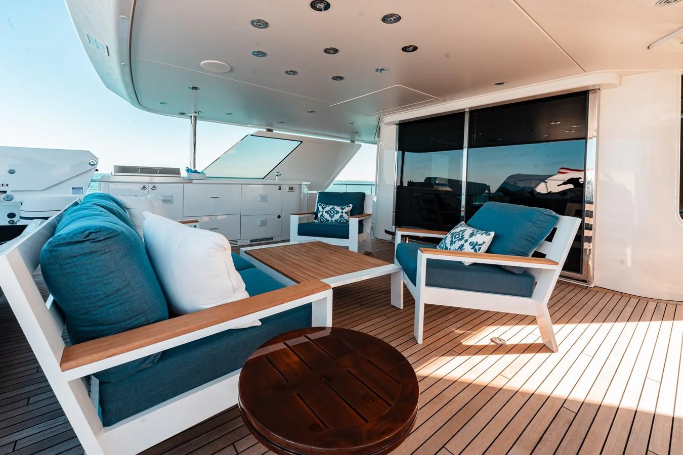 a room with a bed and a table aboard BLUE TIME Yacht for Sale