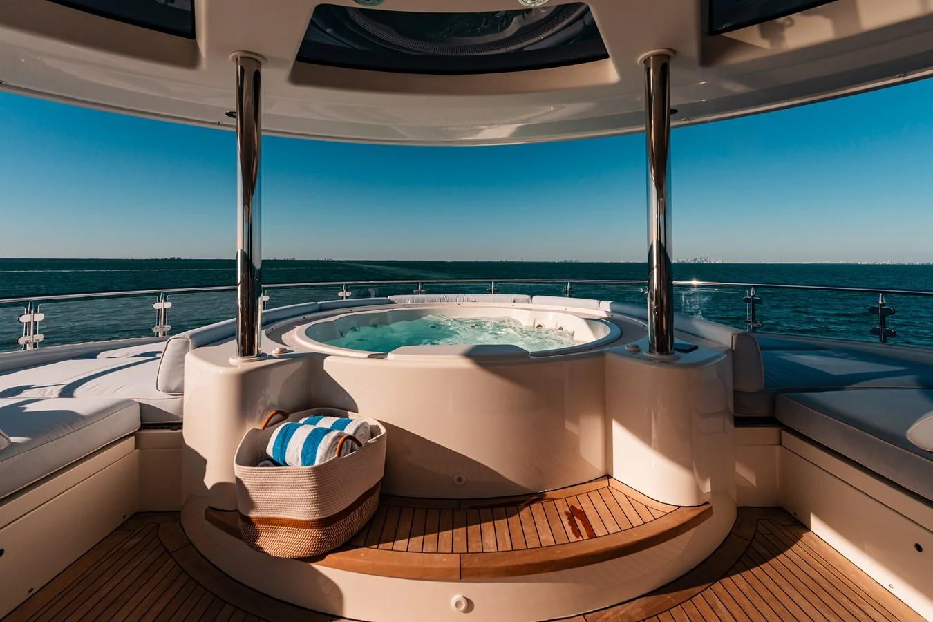a bathtub with a sink and a rug on the floor aboard BLUE TIME Yacht for Sale