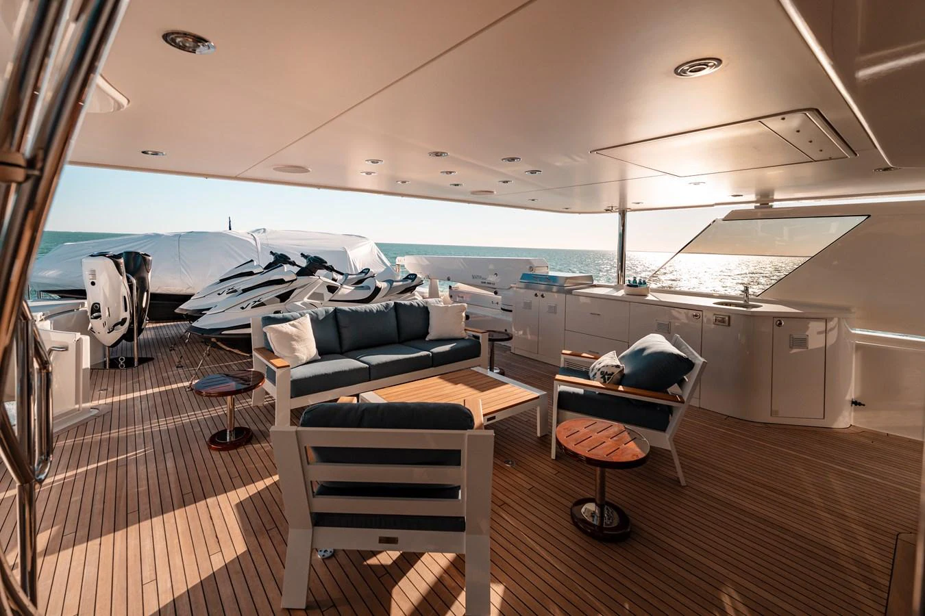 a room with a bed and a couch aboard BLUE TIME Yacht for Sale