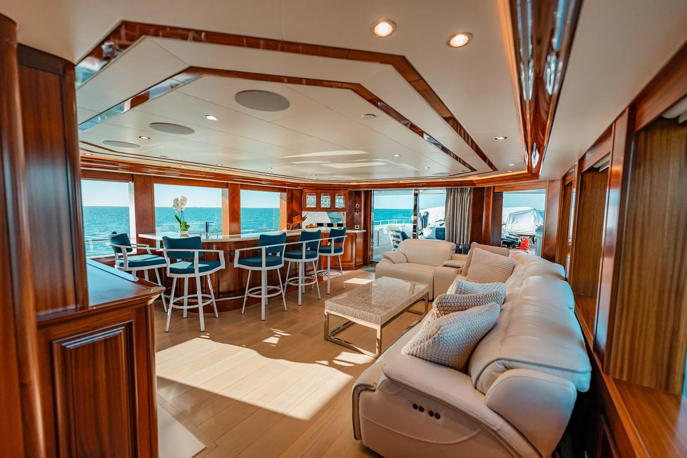 a living room with a large open window aboard BLUE TIME Yacht for Sale