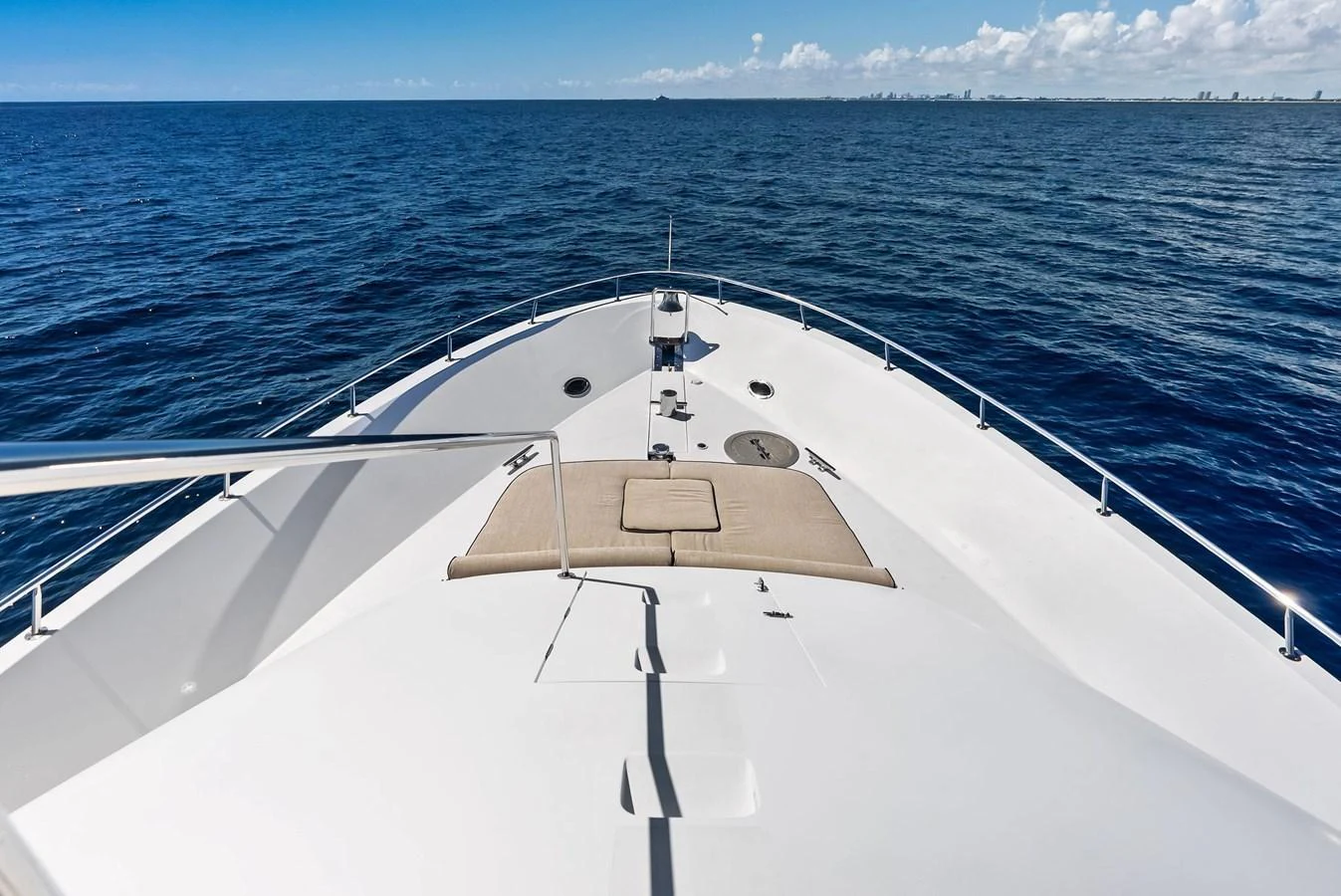 The yacht's foredeck offers a spacious and sleek area with a sunpad for relaxation. aboard BRAVO ZULU Yacht for Sale