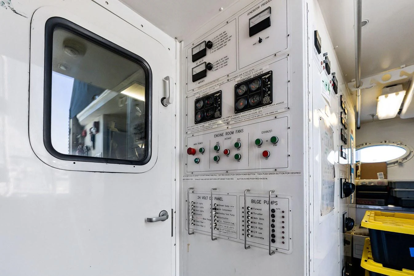 The image showcases the yacht's control panel area with various switches and gauges. aboard BRAVO ZULU Yacht for Sale