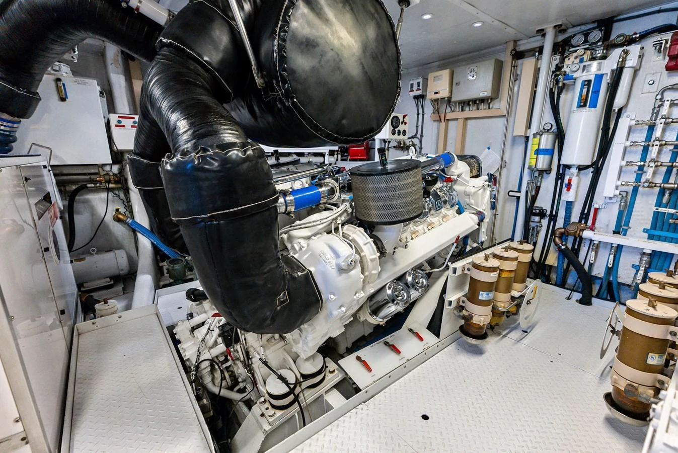 The image showcases the yacht's engine room with its intricate machinery and equipment. aboard BRAVO ZULU Yacht for Sale