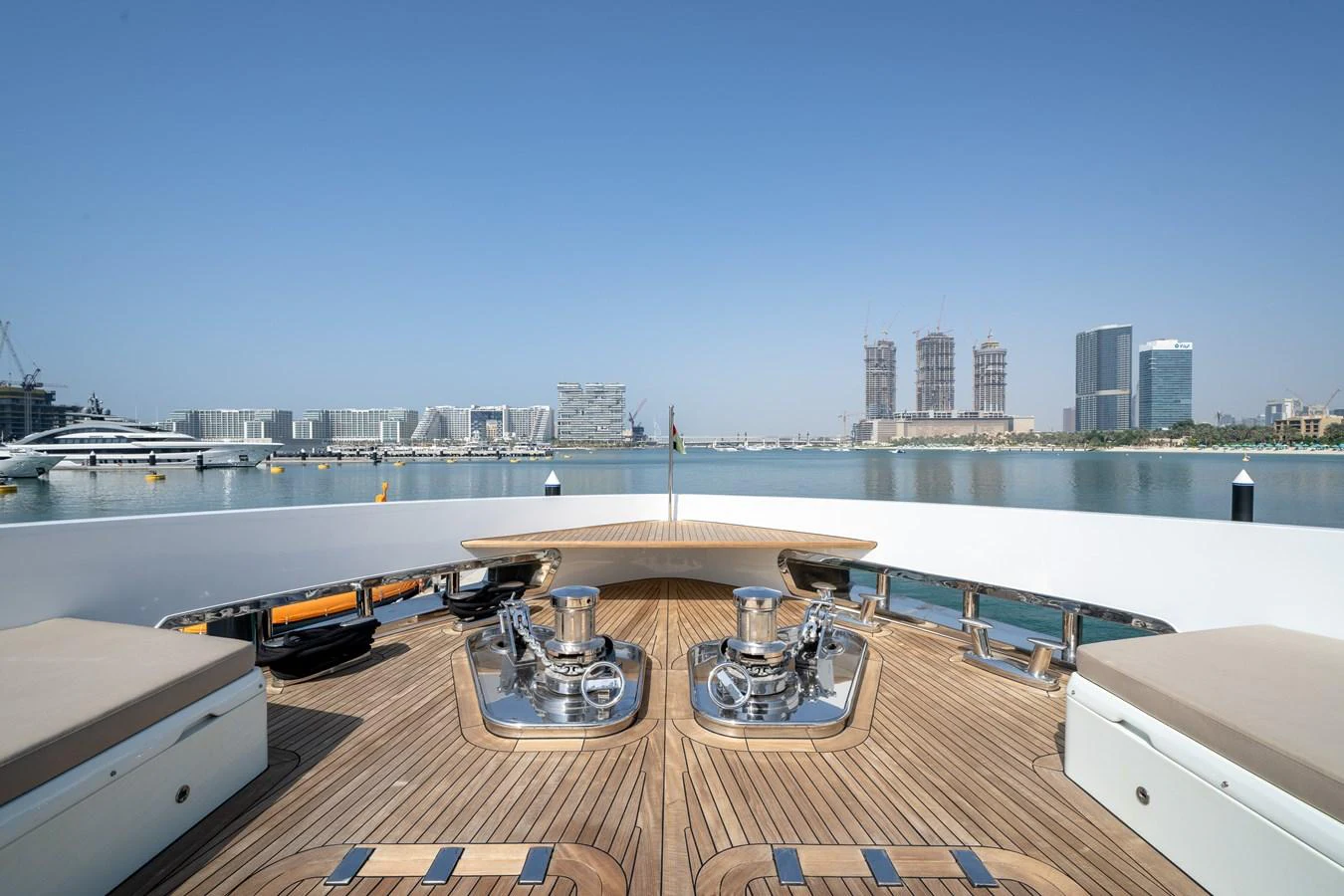 The foredeck offers a spacious and elegant area with a clear view of the surrounding marina. aboard M/Y MASHA Yacht for Sale