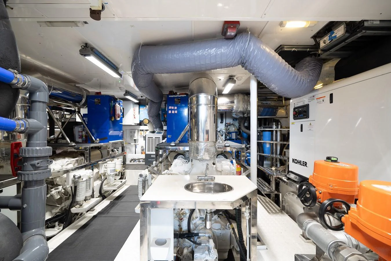 The engine room is equipped with advanced machinery and well-organized systems for optimal performance. aboard M/Y MASHA Yacht for Sale