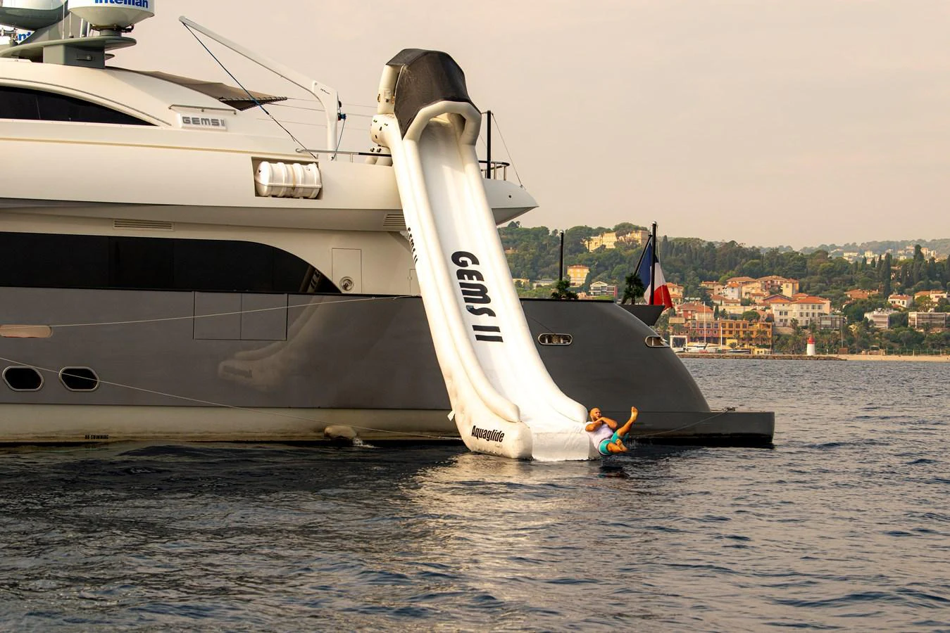 The yacht features an exciting water slide for fun and enjoyment on the water. aboard GEMS II Yacht for Sale