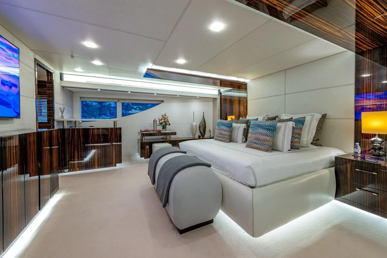 The master stateroom features luxurious bedding and modern decor, creating a serene retreat. aboard GEMS II Yacht for Sale