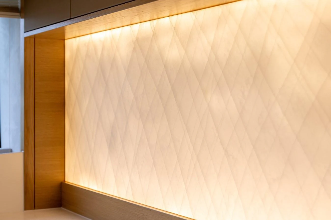 A close-up view of a beautifully illuminated wall detail on the yacht. aboard GRIT Yacht for Sale