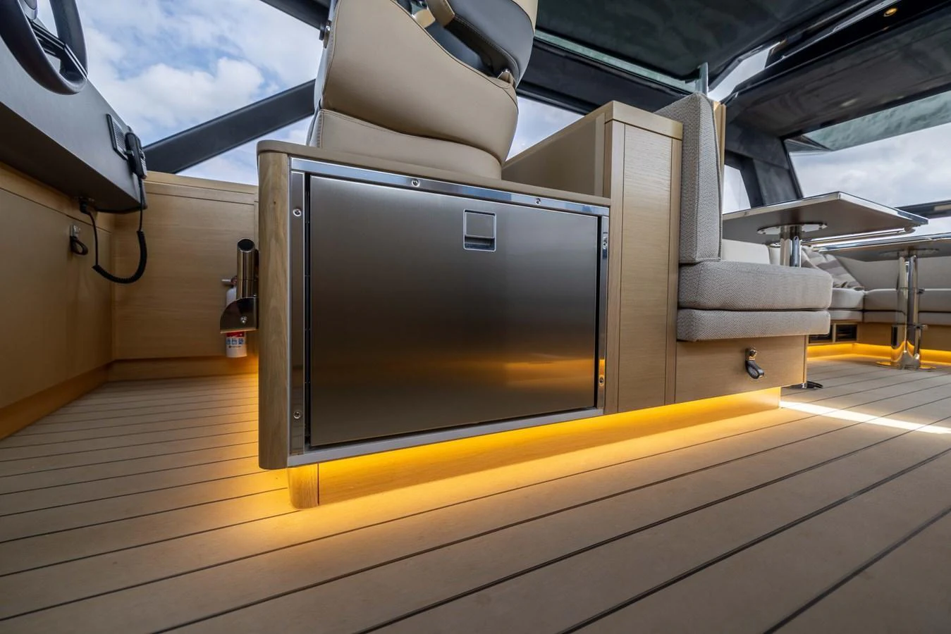 The yacht's interior features sleek, modern design with ambient lighting and high-quality materials. aboard GRIT Yacht for Sale