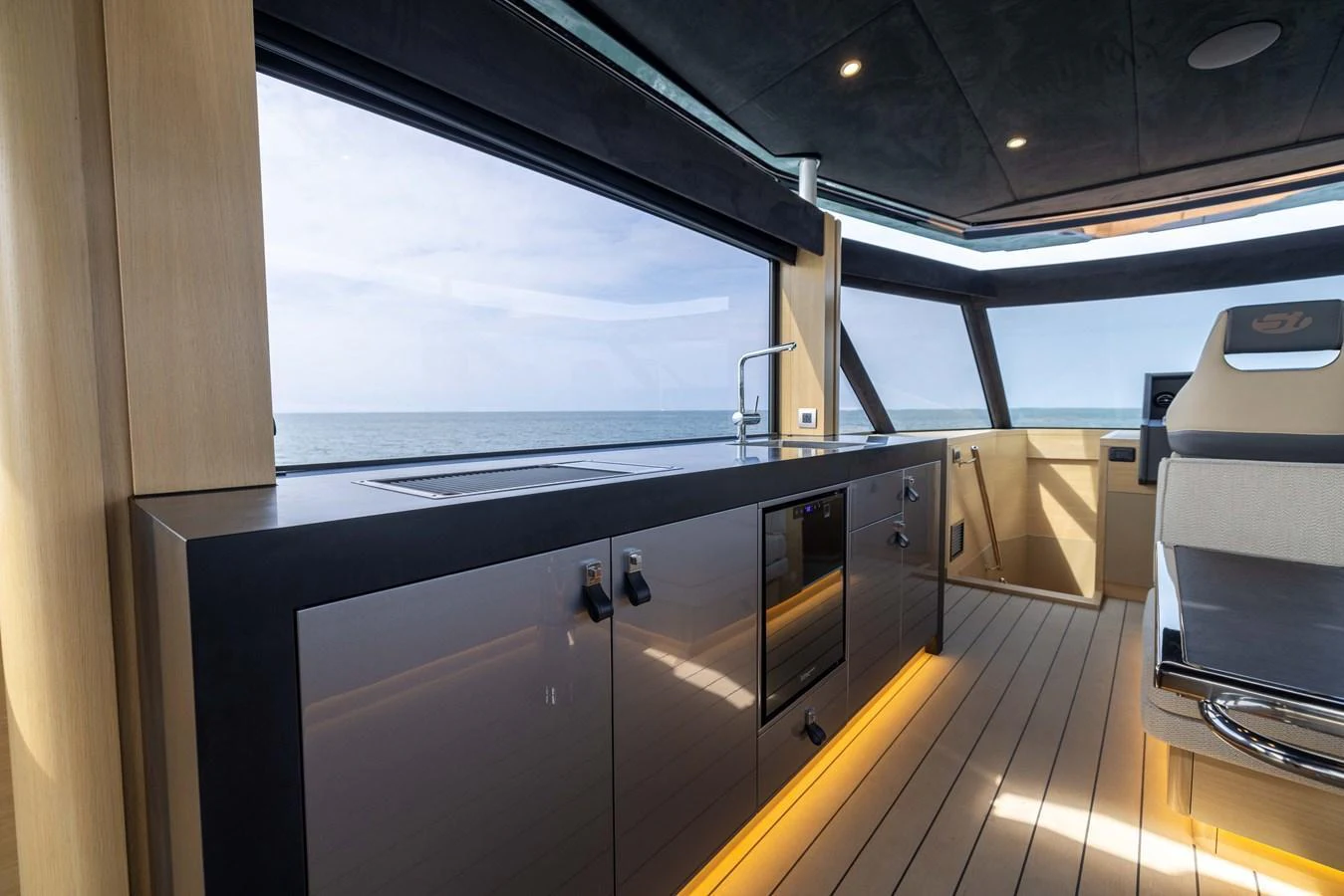 The sleek and modern galley offers stunning ocean views through large windows. aboard GRIT Yacht for Sale