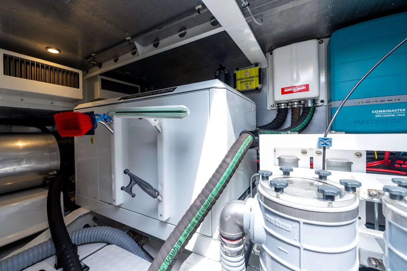 The image showcases the well-organized and clean engine room of the yacht, highlighting its advanced machinery and equipment. aboard GRIT Yacht for Sale