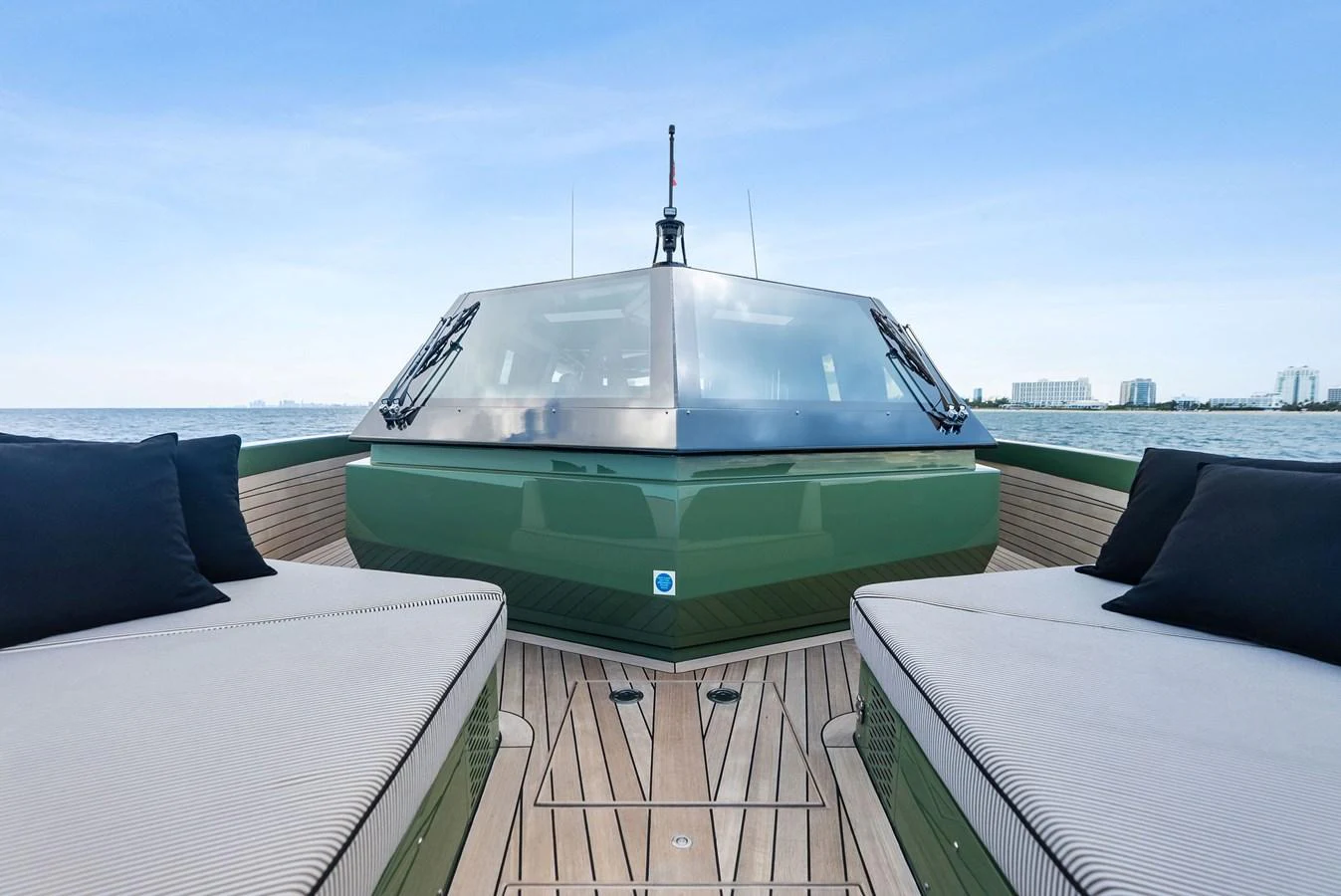 A sleek yacht with modern design elements is showcased on the open water. aboard ANOTHER WORLD Yacht for Sale