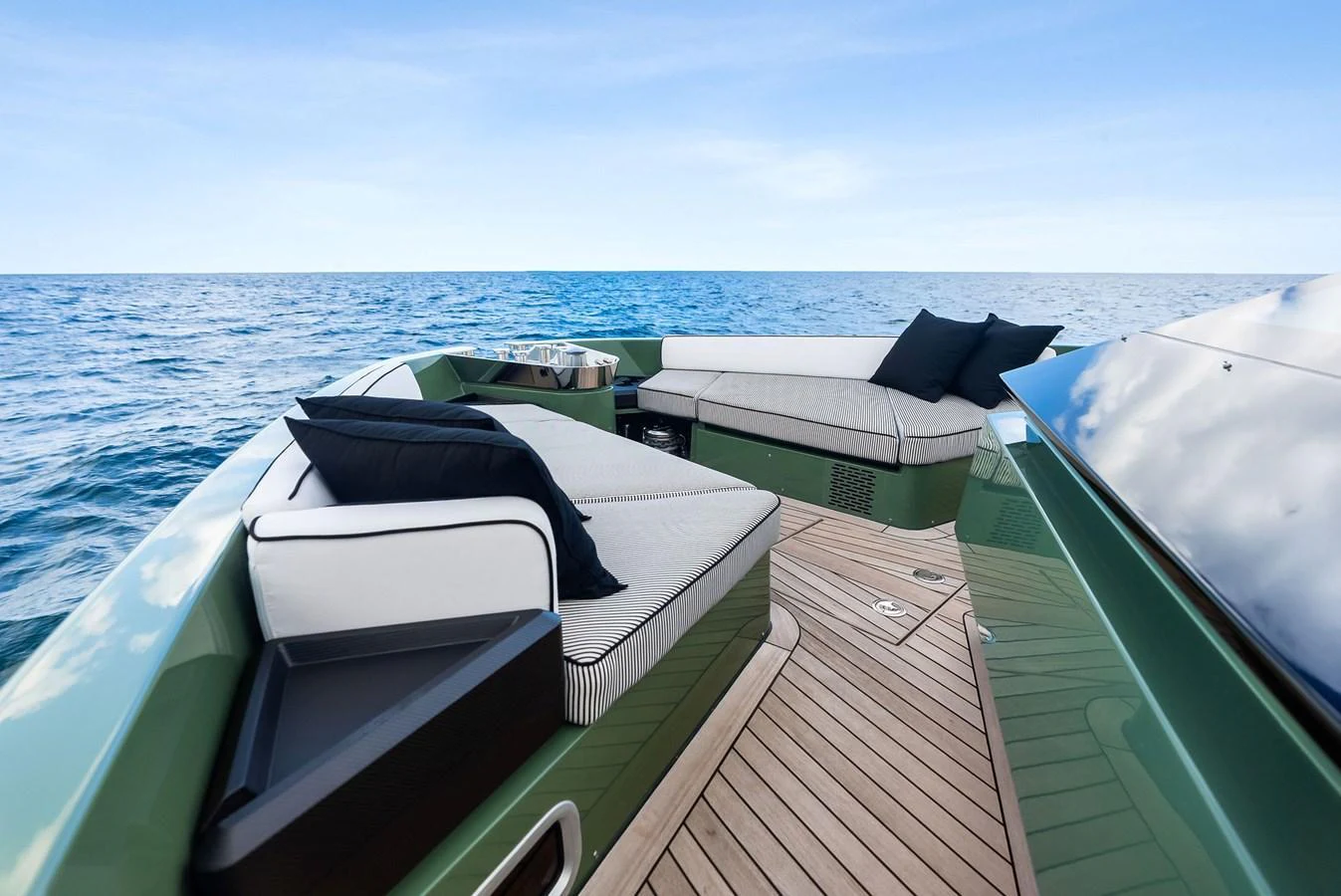 The yacht's bow features luxurious seating with a stunning ocean view. aboard ANOTHER WORLD Yacht for Sale