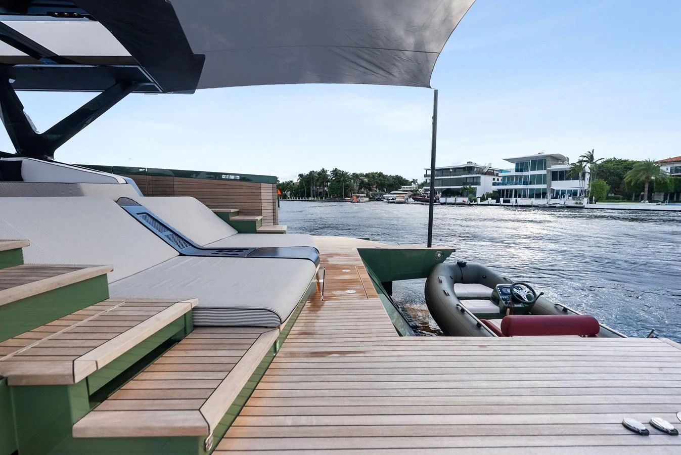 The aft deck features comfortable seating and a view of the serene waters. aboard ANOTHER WORLD Yacht for Sale