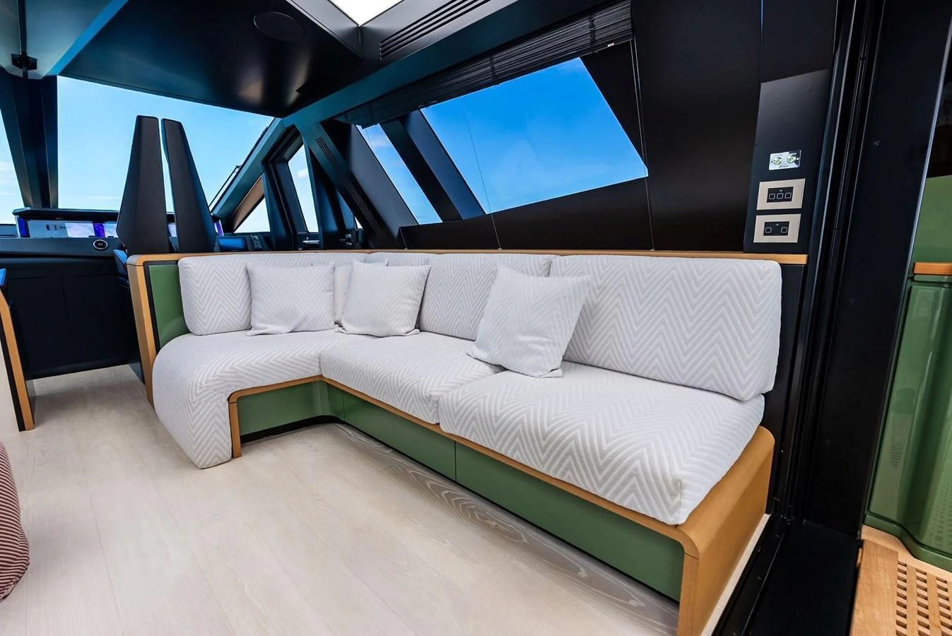 The yacht's salon features a modern, comfortable seating area with large windows offering stunning views. aboard ANOTHER WORLD Yacht for Sale