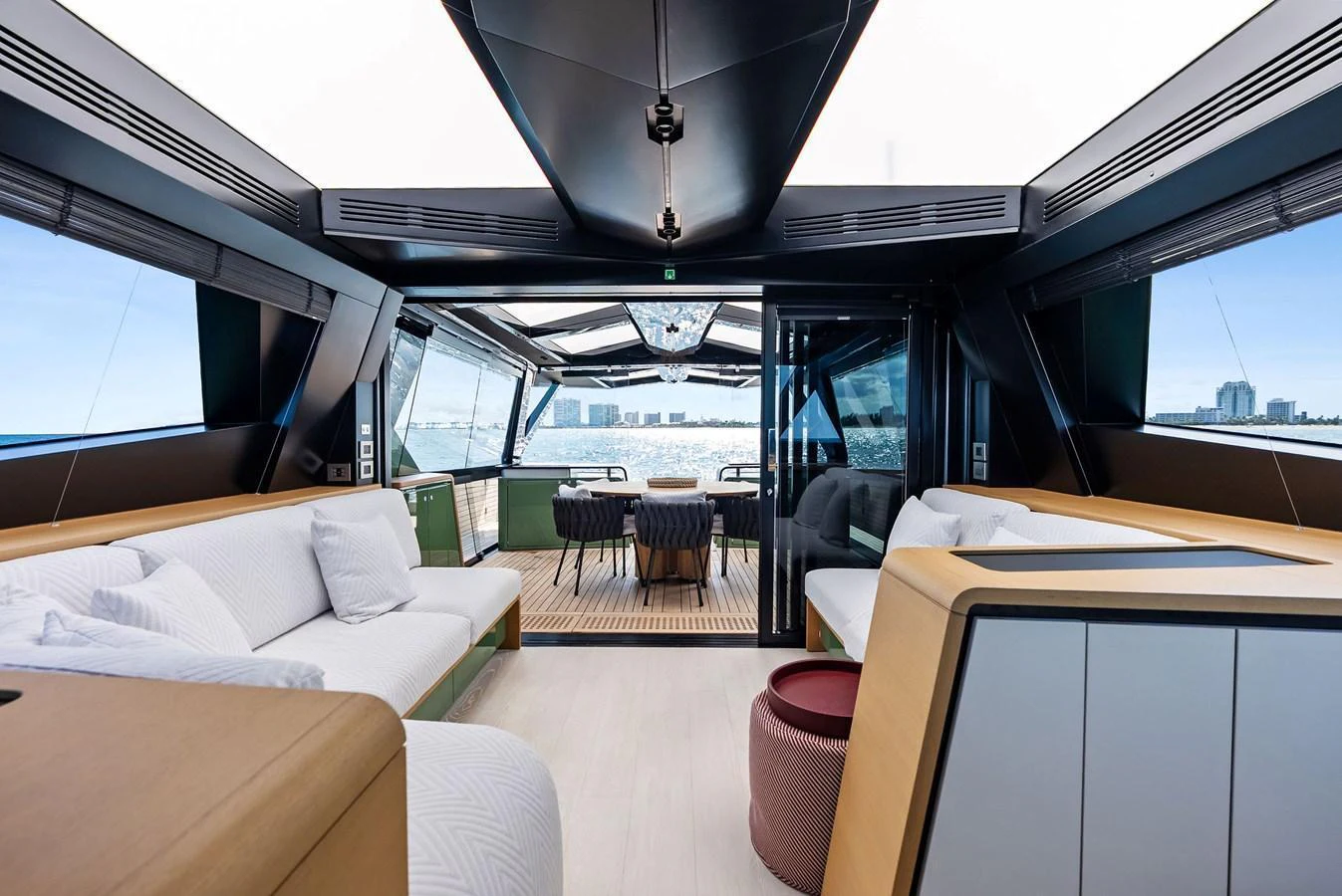 The salon offers a spacious and modern lounging area with panoramic views. aboard ANOTHER WORLD Yacht for Sale