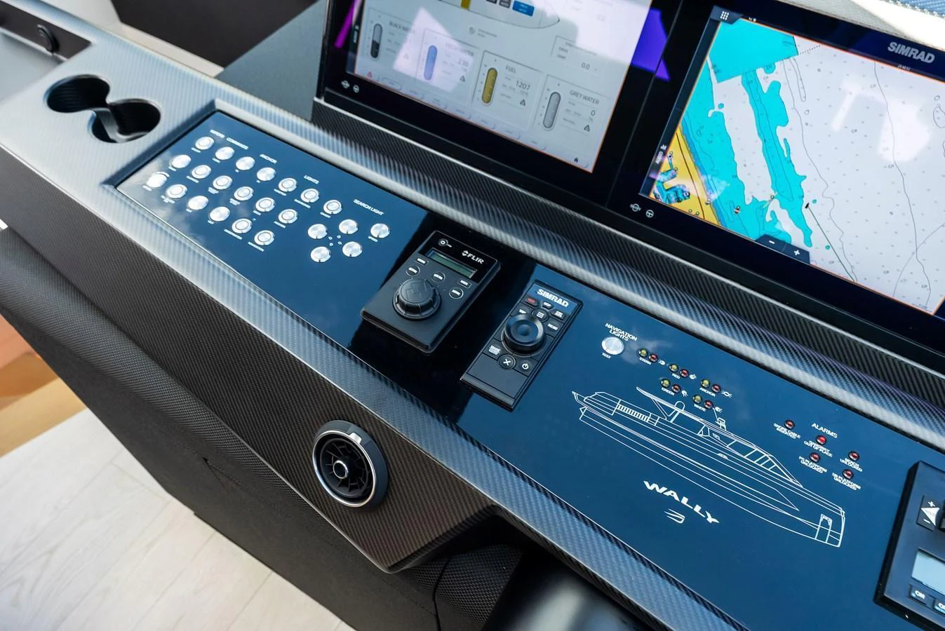 The helm station features advanced navigation and control systems with a sleek, modern design. aboard ANOTHER WORLD Yacht for Sale