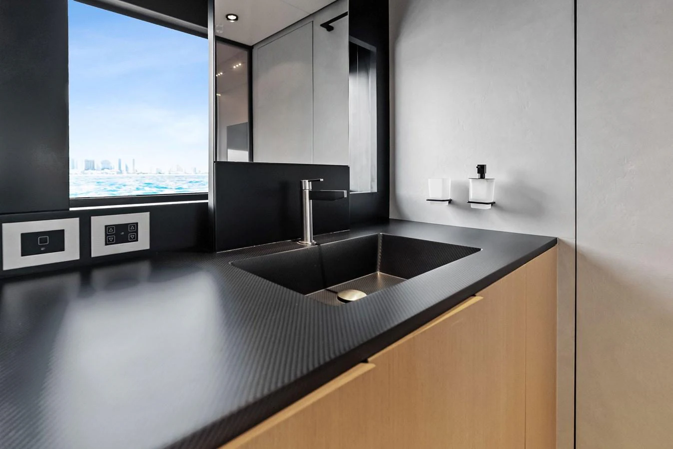 A sleek and modern galley with a minimalist design and high-end finishes. aboard ANOTHER WORLD Yacht for Sale