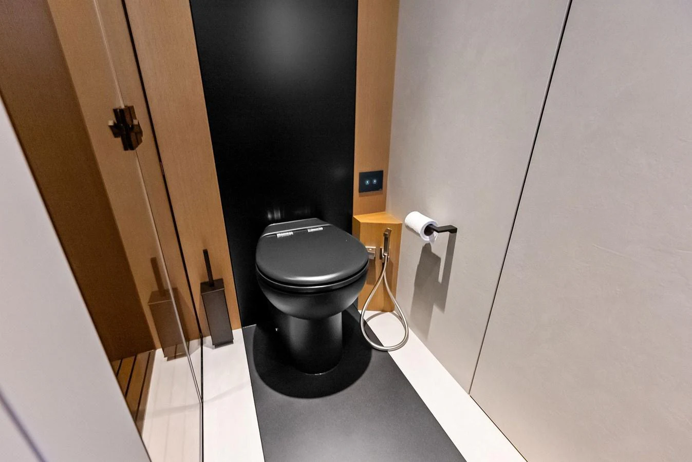 A modern yacht bathroom featuring sleek design and high-quality fixtures. aboard ANOTHER WORLD Yacht for Sale