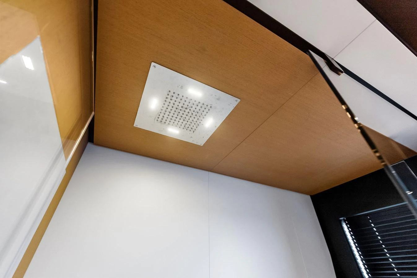 A modern yacht interior ceiling with a built-in light fixture. aboard ANOTHER WORLD Yacht for Sale