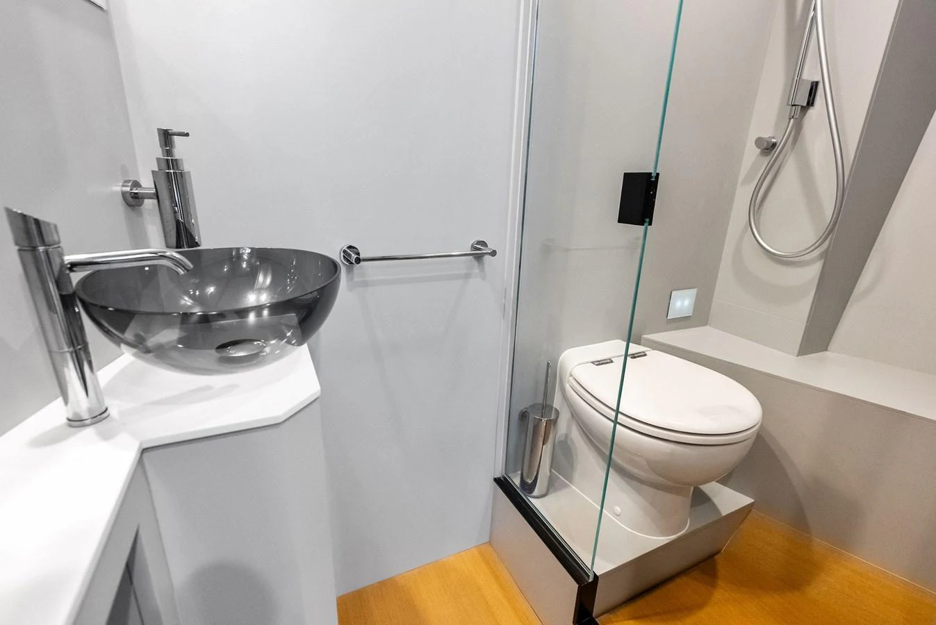 The yacht's bathroom features modern fixtures and a sleek design. aboard ANOTHER WORLD Yacht for Sale