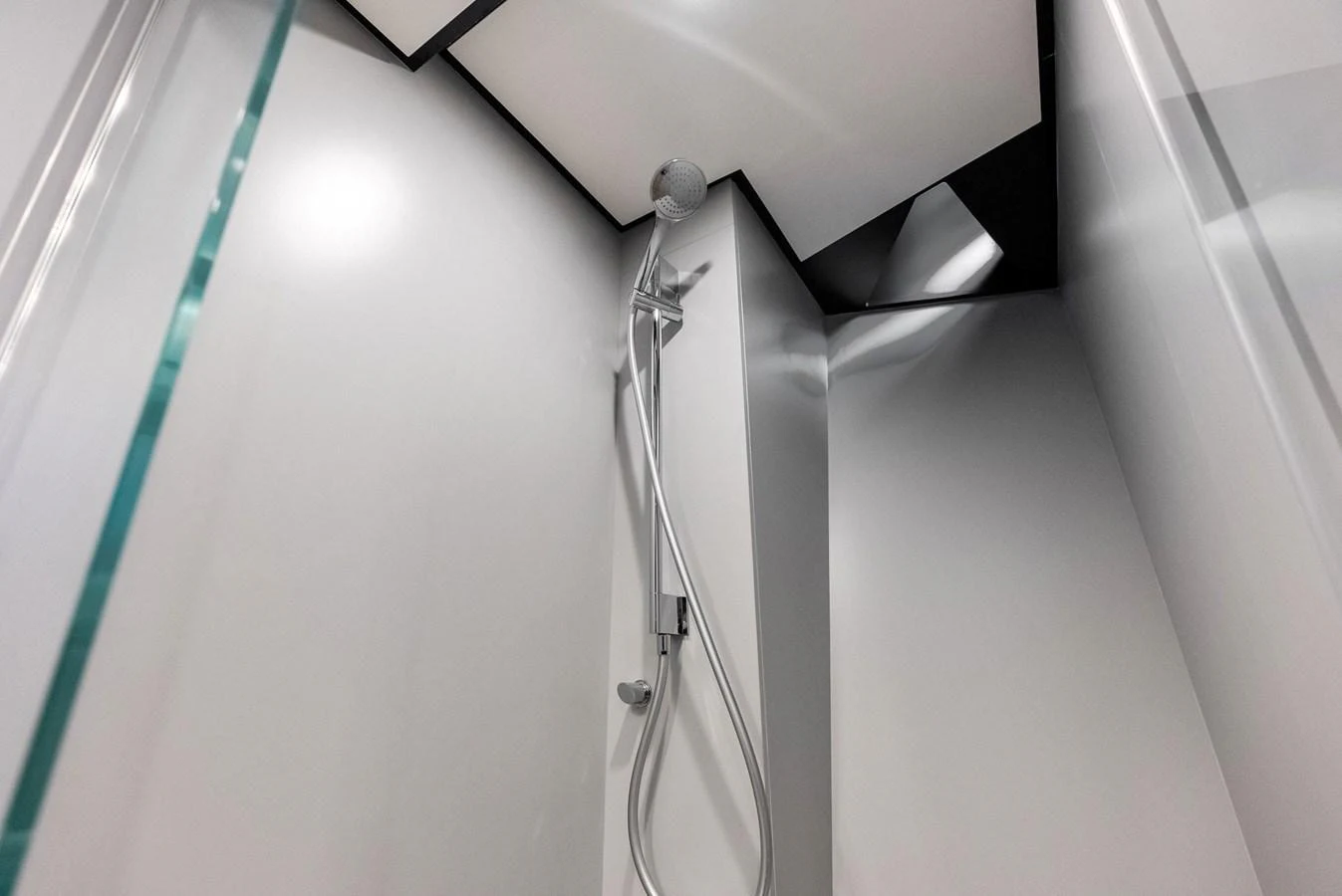 A sleek and modern shower area with minimalist design. aboard ANOTHER WORLD Yacht for Sale
