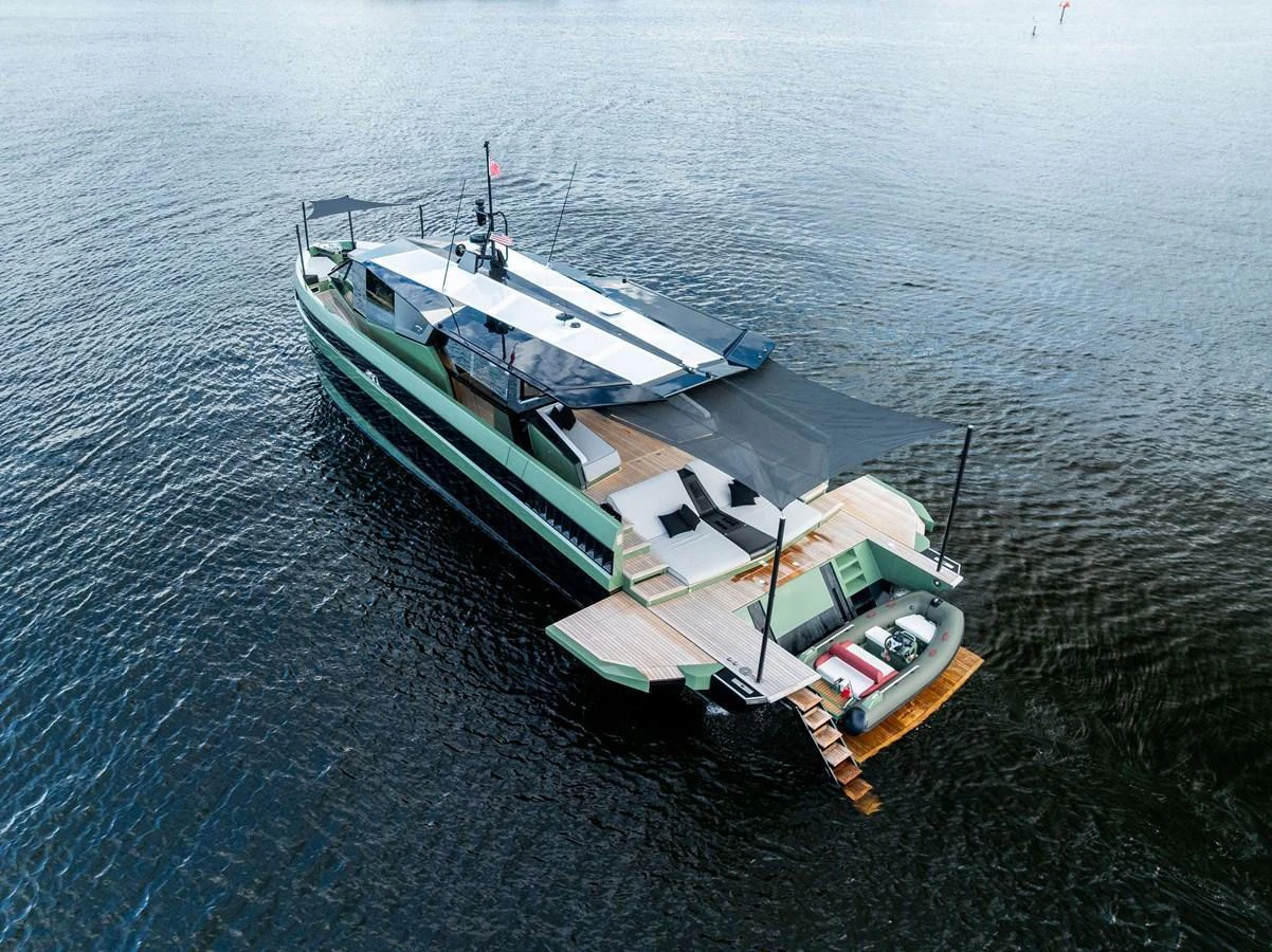 This sleek yacht features a spacious aft deck with lounging areas and easy water access. aboard ANOTHER WORLD Yacht for Sale