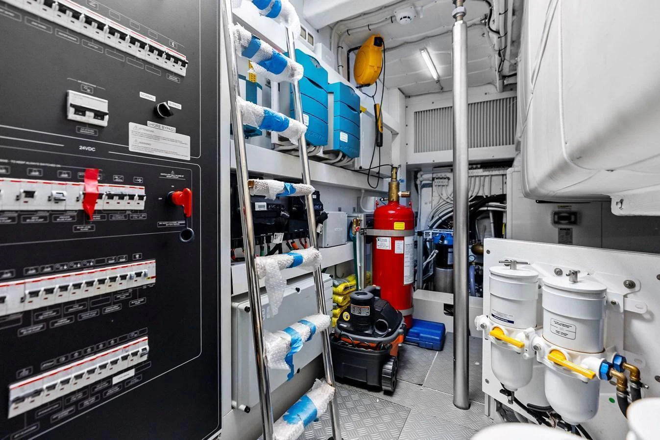 The engine room is equipped with advanced machinery and essential maintenance tools. aboard ANOTHER WORLD Yacht for Sale