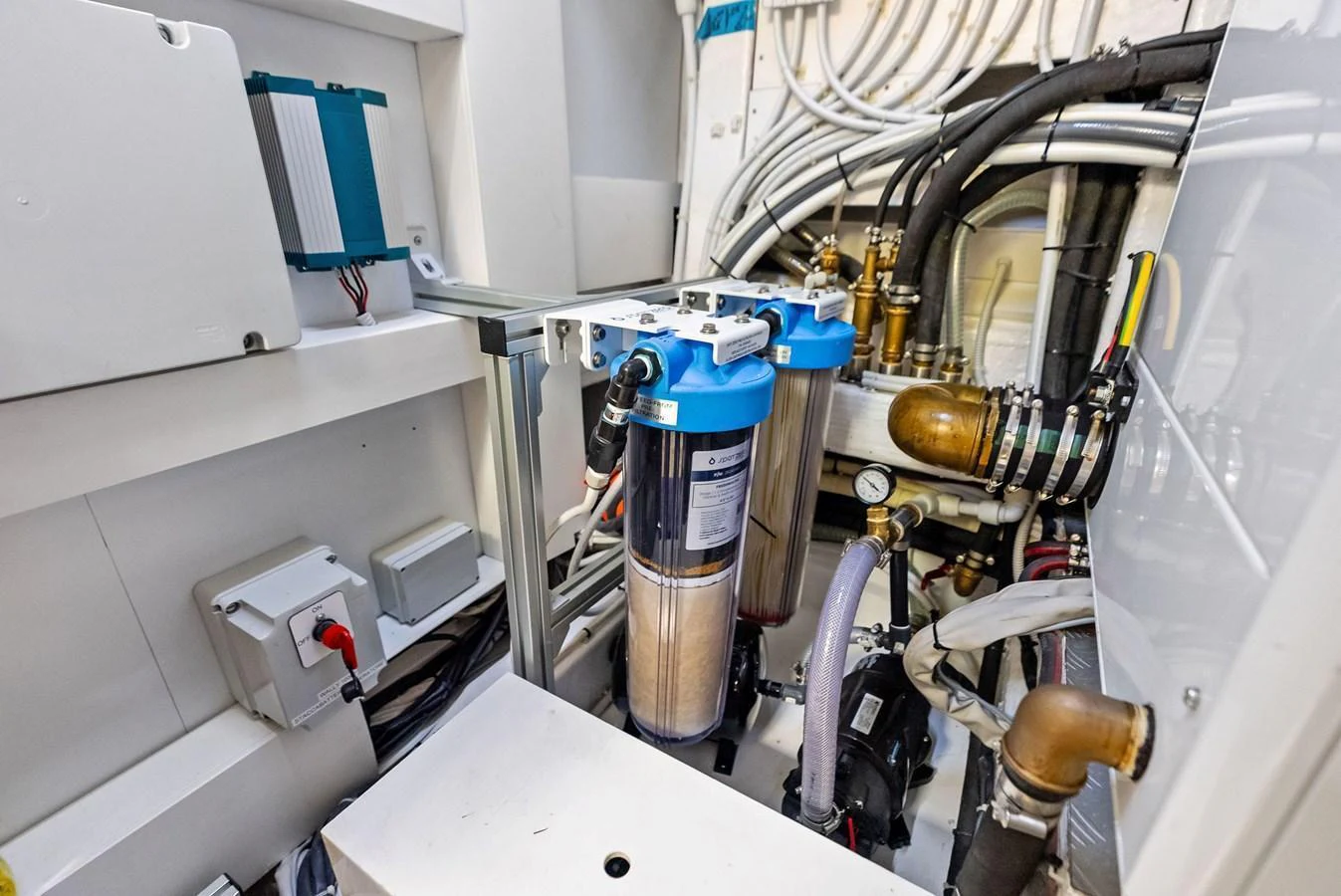 The image showcases the yacht's technical area with various machinery and equipment. aboard ANOTHER WORLD Yacht for Sale