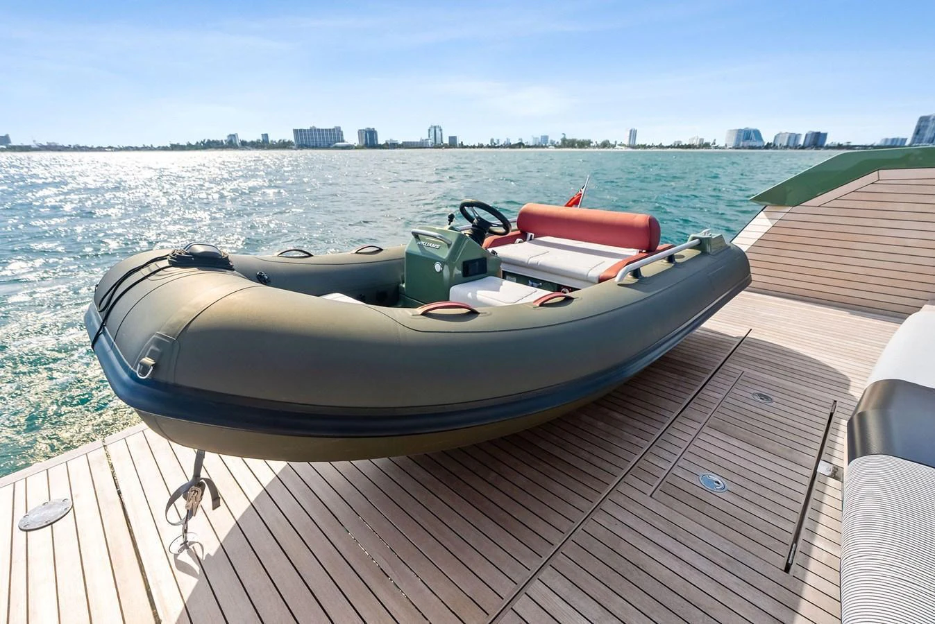 A sleek tender is positioned on the yacht's deck, ready for an adventure on the water. aboard ANOTHER WORLD Yacht for Sale