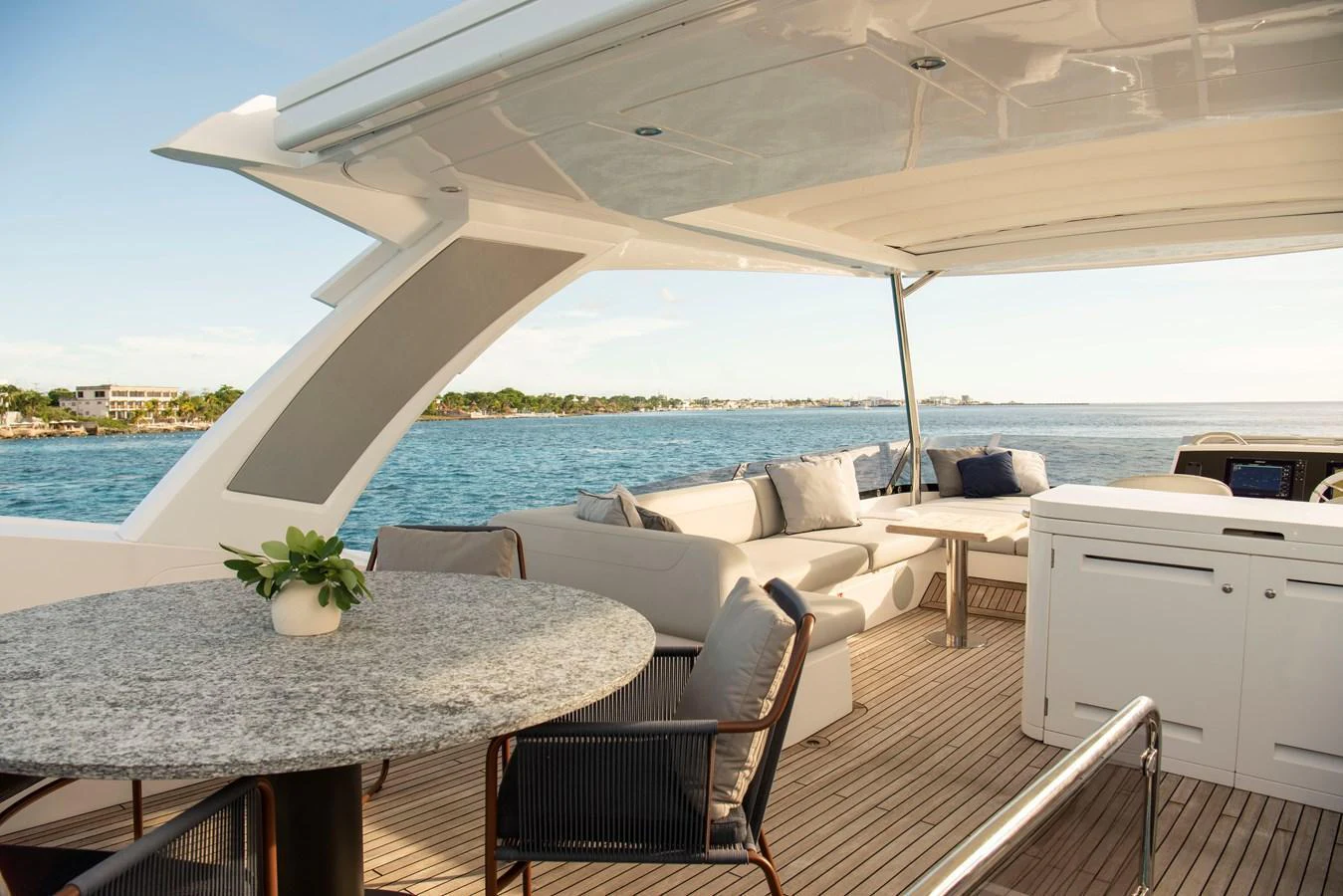 The aft deck offers a spacious and inviting area for relaxation and dining with stunning ocean views. aboard GAIA Yacht for Sale
