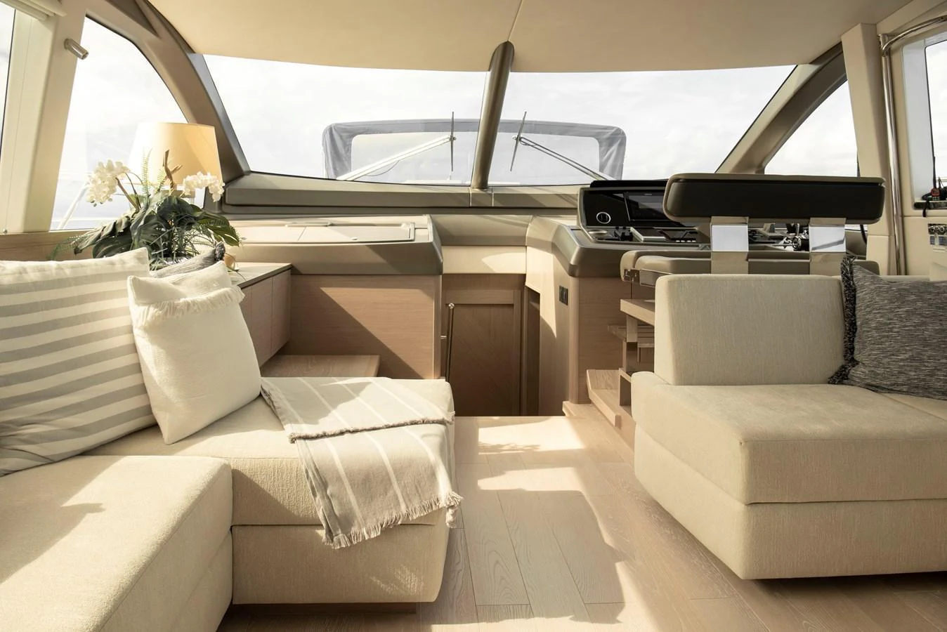 The salon offers a cozy and elegant space with plush seating and modern decor. aboard GAIA Yacht for Sale