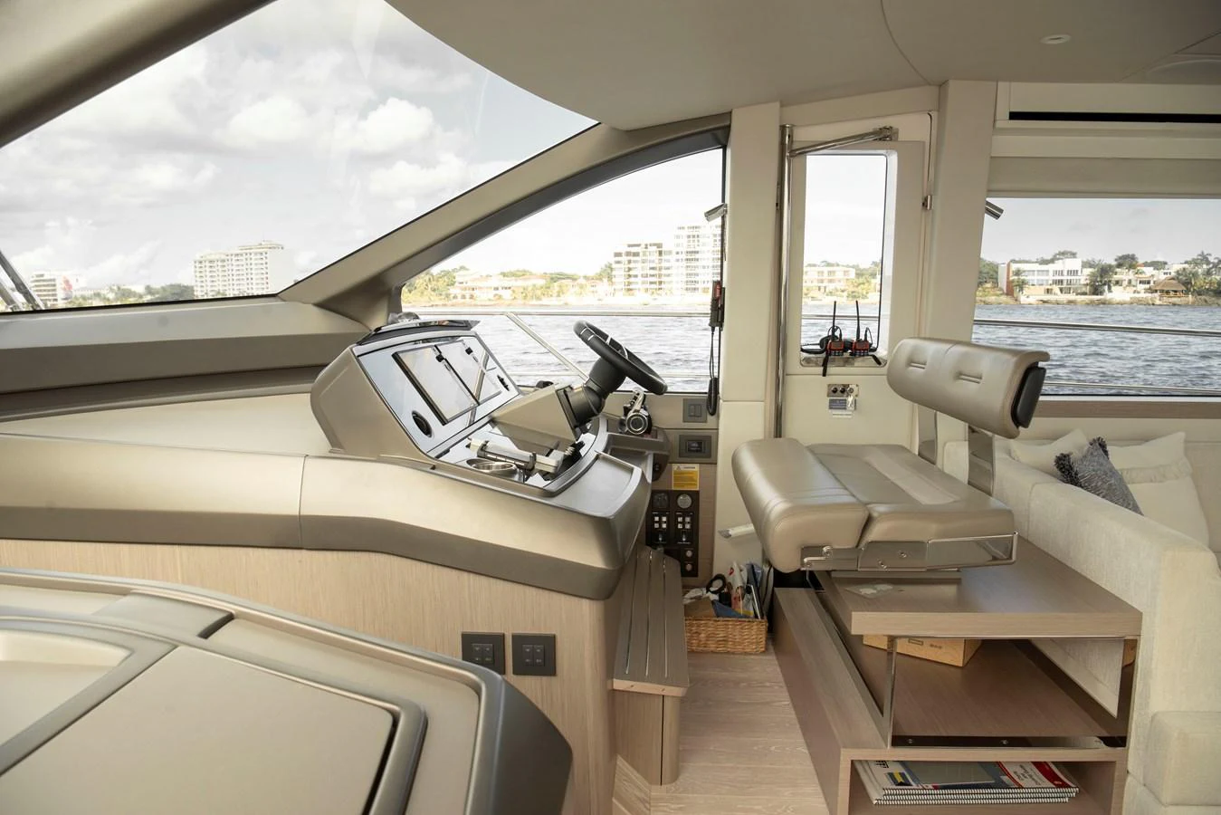 The helm station offers a sleek and modern control area with expansive views of the water. aboard GAIA Yacht for Sale