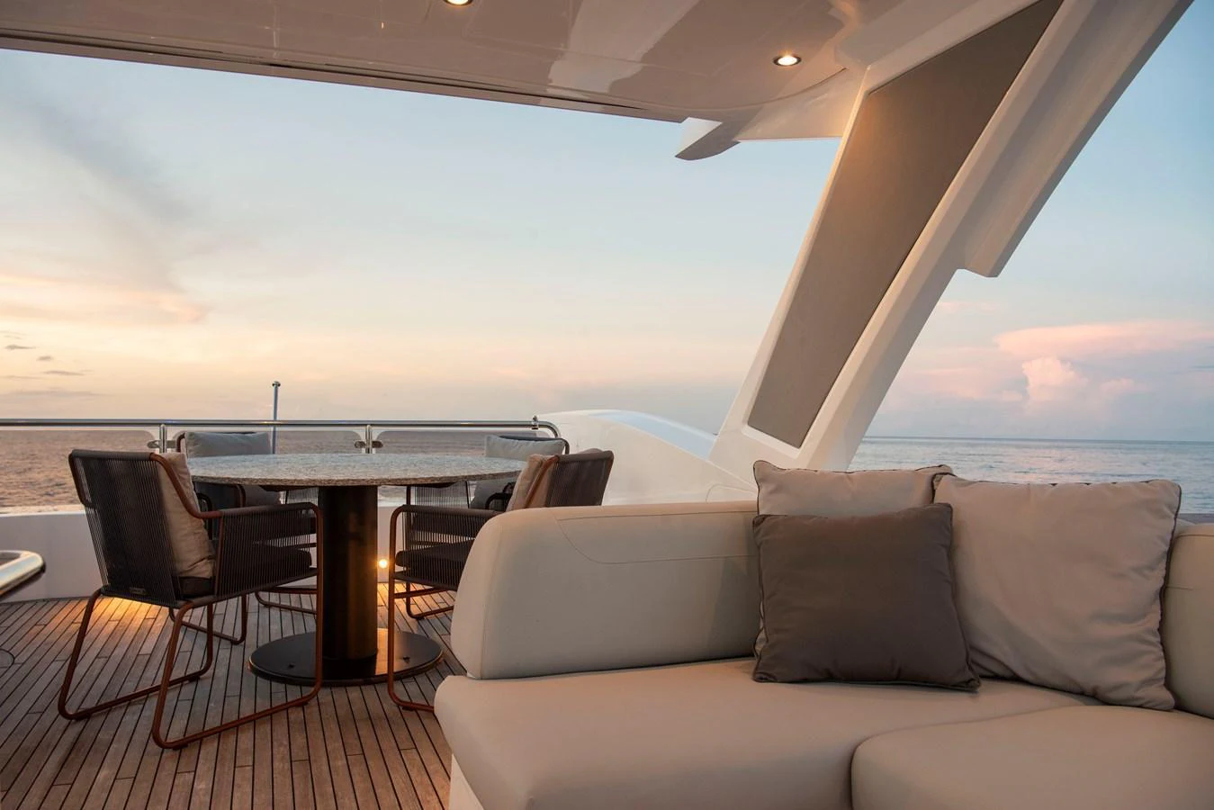 The aft deck offers a serene setting with comfortable seating and a dining area overlooking the sea. aboard GAIA Yacht for Sale