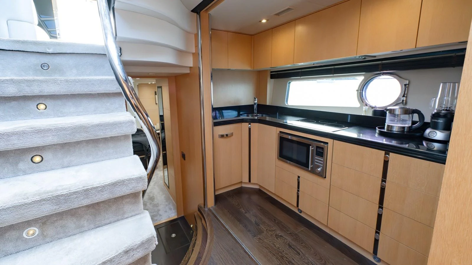 The galley features modern appliances and ample storage, creating a functional and stylish space for meal preparation. aboard ZAZA Yacht for Sale