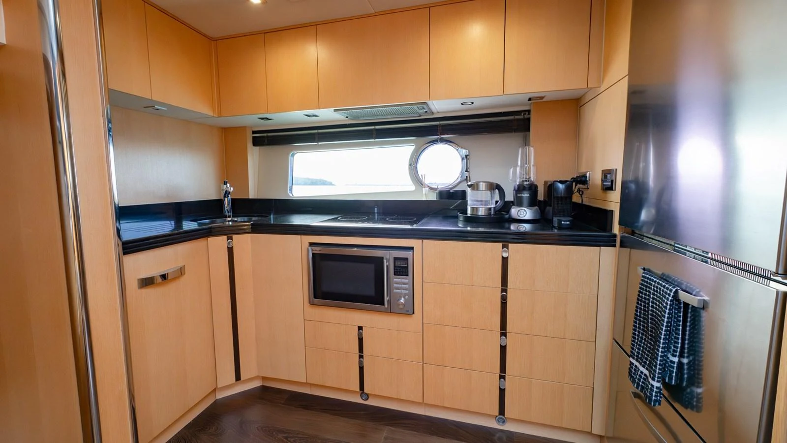 The yacht's galley is equipped with modern appliances and ample counter space. aboard ZAZA Yacht for Sale
