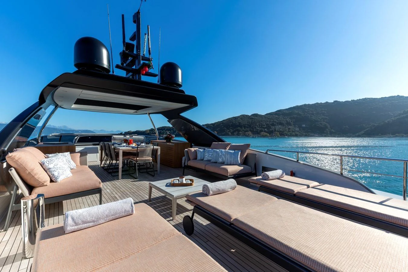 The sundeck offers luxurious lounging areas with stunning views of the surrounding waters. aboard QUEEN MARTINA Yacht for Sale