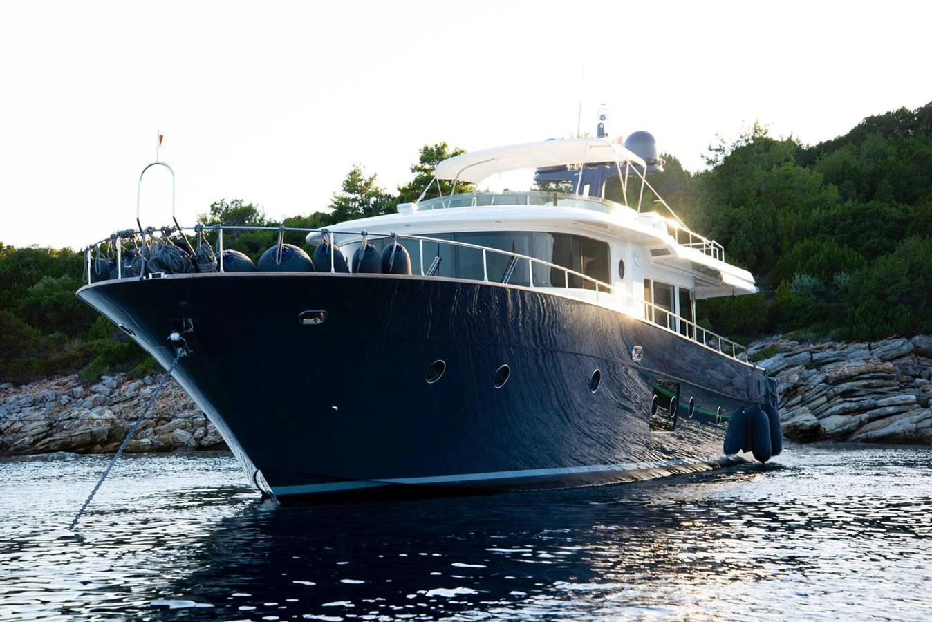 a boat on the water aboard NEVER TOO LATE Yacht for Sale