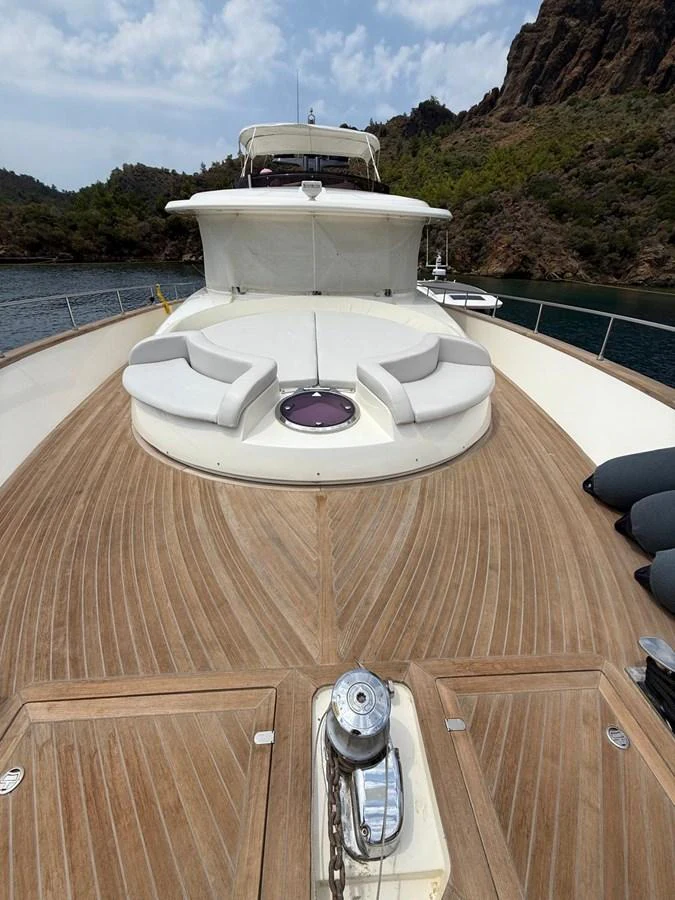 a white dome on a wooden surface aboard NEVER TOO LATE Yacht for Sale
