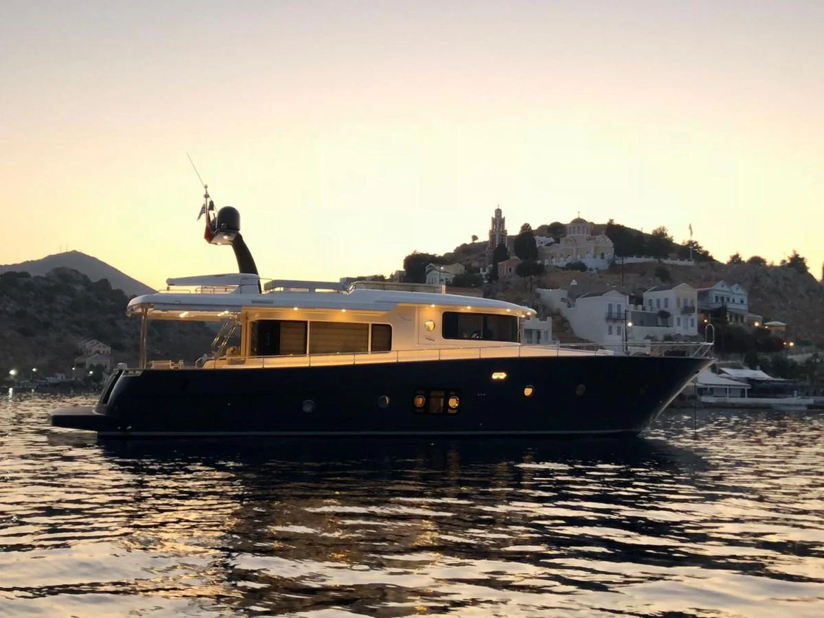 a boat on the water aboard NEVER TOO LATE Yacht for Sale
