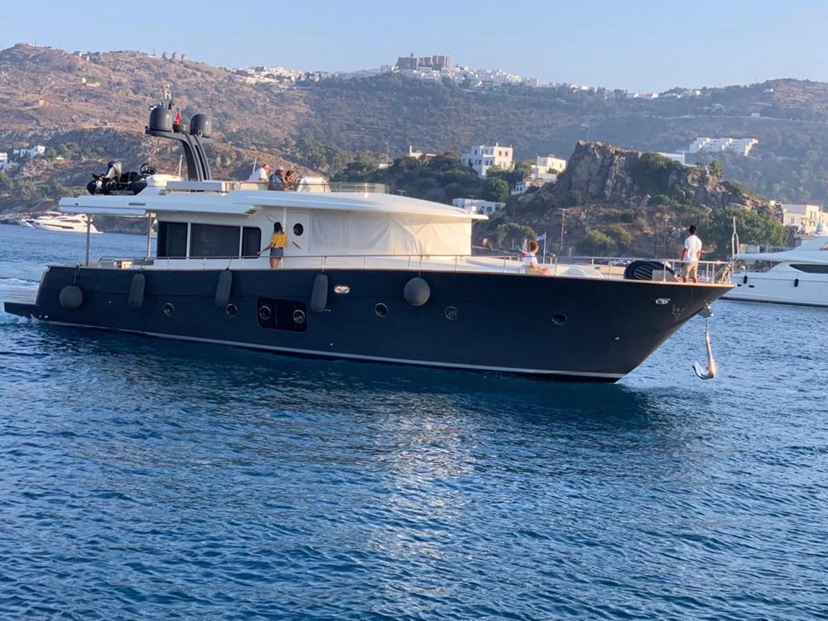 a boat on the water aboard NEVER TOO LATE Yacht for Sale