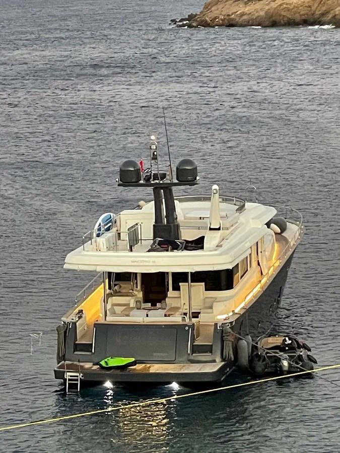 a boat in the water aboard NEVER TOO LATE Yacht for Sale